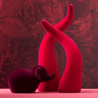 Exceptional Adriani e Rossi Horn Velvet Sculpture set crafted in ceramic with a ruby-colored velvet finish