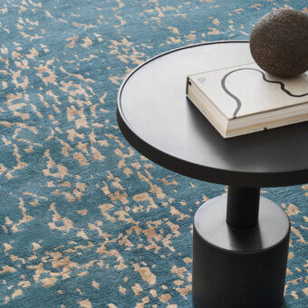 Lavish Amini Artemisia rug with abstract design in teal and gold, hand-knotted wool and viscose with a hand-washed finish