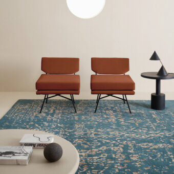 Distinguished Amini Artemisia rug with abstract pattern in muted teal, woven from wool and viscose with a hand-washed, carved finish