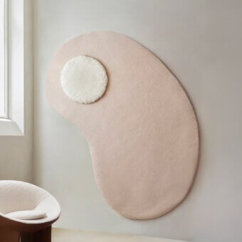 Exceptional Amini Ciclopi-Sasso rug hand-knotted in pure organic wool with a dusty rose form and creamy white inset finish