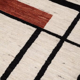 Distinguished Amini Collective rug hand-knotted from Afghanistan wool with bold geometric pattern and Italian finish