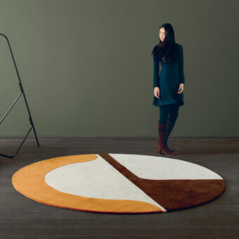 Exceptional Amini JC-7 Isola rug with bold geometric color blocking in wool and a carefully carved pile