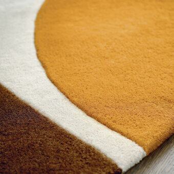 Lavish Amini JC-7 Isola rug with geometric color blocks in wool and a carefully carved pile