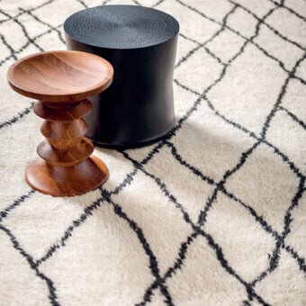 Exceptional Amini Nomadic rug with geometric pattern in black against off-white wool and mohair, hand-washed carved finish