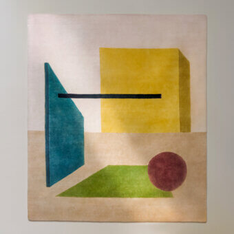 Exclusive Amini Nostalghia rug with contemporary abstract design in muted yellow, teal, burgundy, and green organic cotton with hand-washed finish