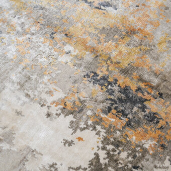 Distinguished Amini Pangea Geo rug hand-knotted with wool and bamboo silk in muted gold, gray, and charcoal tones with a hand-washed finish