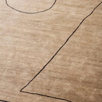 Refined Amini Ritagli nettle rug with abstract lines crafted in hand-knotted wool and nettle yarn with a washed finish