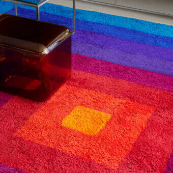 Distinguished Amini Romantica-Square rug hand-tufted in New Zealand wool with a plush hand-carved pile and vibrant magenta to indigo bands