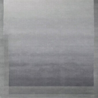 Distinguished Amini Trasparenze rug with layered shades of grey and hand-washed carved New Zealand wool pile