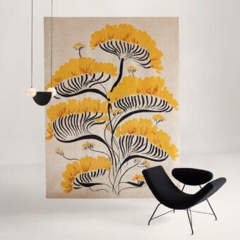 Lavish Amini Valparaise rug with artistic floral motifs in yellow silk and New Zealand wool, hand-washed with carved finish