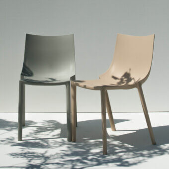 Elegant Driade Bo chair in grayish-taupe technopolymer presents a smooth matte finish with an integrated shell-like structure crafted in Italy