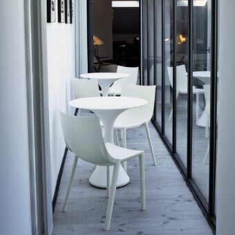 Distinctive Driade Bo chair with fluid sculptural silhouette crafted in durable technopolymer and smooth matte white finish