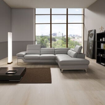 Sophisticated Egoitaliano Princess reclining sectional in light gray textile with polished stainless steel feet
