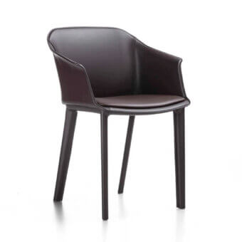 Superior Enrico Pellizzoni Eva armchair upholstered in luxurious leather with a matte burgundy finish and sleek dark legs