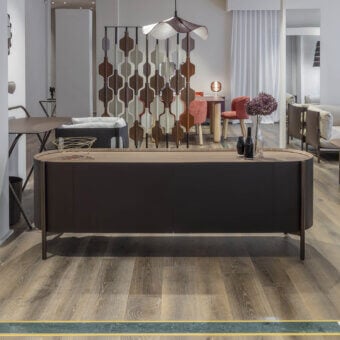 Exclusive Enrico Pellizzoni Iris sideboard built with Canaletto walnut and premium leather upholstery in contrasting dark brown tones