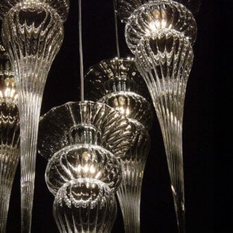 Distinguished melogranoblu Opera - Turandot suspension lamp crafted from ruled hand-blown glass with silver-grey tones and silk tassel