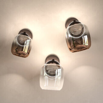 Distinguished Ozzio Italia Botticelle wall lamp with enveloping glass lampshade and warm copper highlights in muted metal