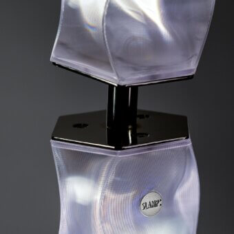 Exceptional Slamp Hugo floor lamp embodying sculptural form with pearlescent white Lentiflex material and iridescent hints