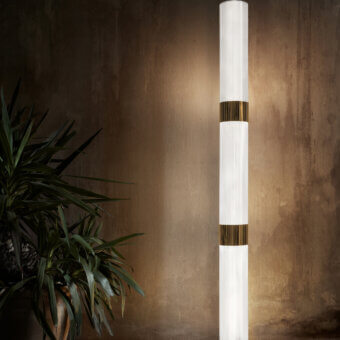 Elegant Slamp La Lollo floor lamp with translucent white Lentiflex® and gilded Steelflex® bands built with a polished steel base