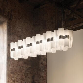 Exceptional Slamp La Lollo Linear suspension lamp crafted in Lentiflex® with Opalflex® finish displaying a milky white hue