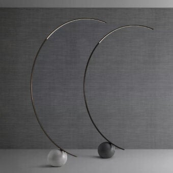 Architectural Bontempi Circle floor lamp with curved arc and light gray spherical base in matte finish metal