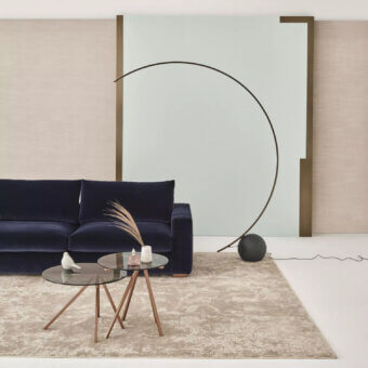 Distinguished Bontempi Circle floor lamp with a matte metal finish and dark textured shade offers directed illumination