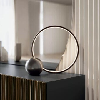 Exceptional Bontempi Circle lamp crafted in Italy with warm gold illumination and a muted metallic satin finish