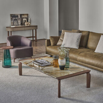 Elegant Porada Askos coffee table with golden yellow marble and Canaletta walnut legs in glossy and satin finishes