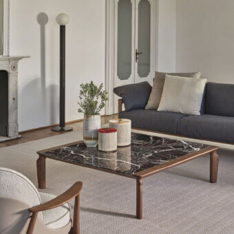 Distinguished Porada Askos coffee table with a striking square form and lavish marble top in black and white veining with a satin Canaletta walnut base