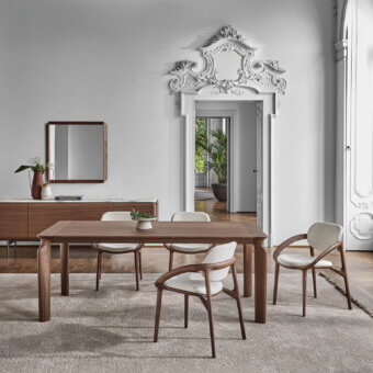 Elegant Porada Amphora table crafted in solid Canaletta walnut with a smooth satin finish presents contemporary style