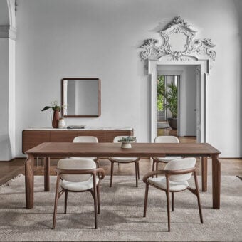 Distinguished Porada Amphora extendable table crafted in Canaletta walnut with a smooth satin finish presents a minimalist aesthetic