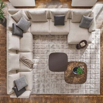 Distinguished Porada Ronny sectional with light beige textile upholstery and multilayer wood construction
