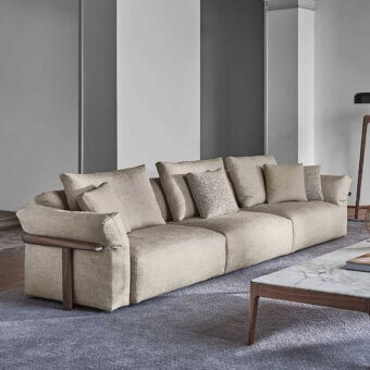 Exceptional Porada Ronny sofa crafted with multilayer wood, poplar, and fir, upholstered in textured neutral beige textile with satin-finish wooden armrests
