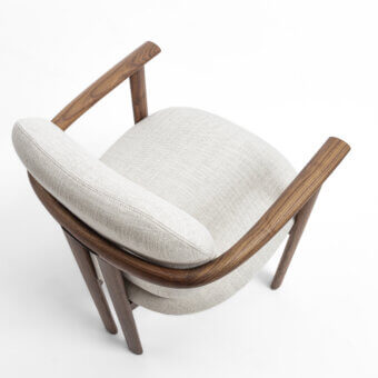 Superior Porada Teti chair crafted in medium-dark wood with satin finish and light beige textured upholstery secured with saddle leather cord