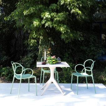 Elegant Driade App Bistrot table crafted in white polyethylene with gracefully curved lines and glossy finish