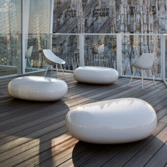 Elegant Driade Koishi ottoman crafted from painted fiberglass with glossy finish and curved lines