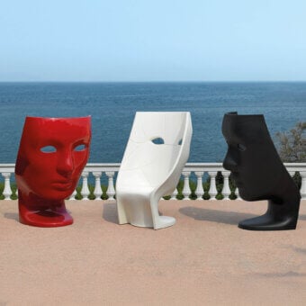 Captivating Driade Nemo Lounge chair sculpted from red polyethylene with a glossy exterior presents an iconic classical visage