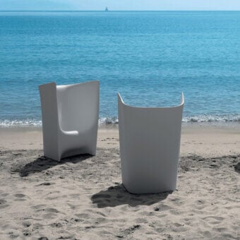 Elegant Driade Pliè lounge chair crafted with durable polyethylene in a light gray matte finish offers a cocoon-like seating experience