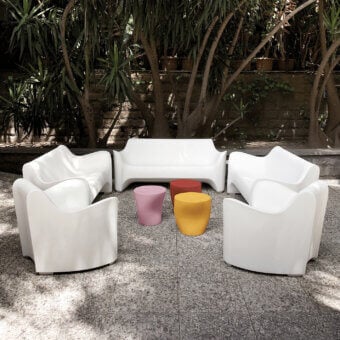 Distinguished Driade Tokyo-Pop coffee table set sculpted from glossy polyethylene with a vibrant orange hue and fluid asymmetric form