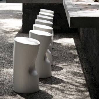 Distinctive Driade Tokyo-Pop stool sculpted from durable polyethylene with a smooth matte white finish and playfully curved form