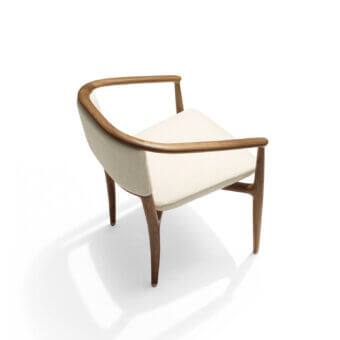 Distinguished Giorgetti Sinbad armchair with sculpted Canaletto walnut frame and subtly textured light beige fabric upholstery