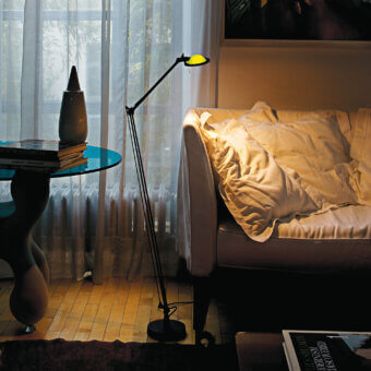 Elegant Luceplan Berenice floor lamp in metal with articulated arms and a glossy conical shade crafted with a satin black finish