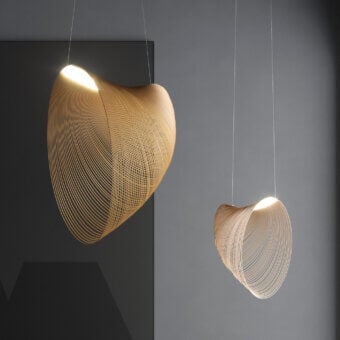 Distinguished Luceplan Illan suspension lamp crafted in natural wood with a uniquely layered, open structure and matte finish