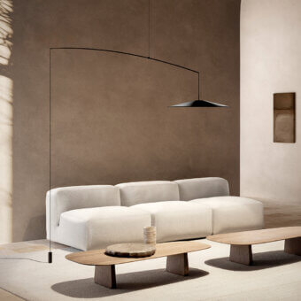 Elegant Luceplan Koinè floor lamp with aluminum structure, carbon stem, and glass lens in a matte black finish