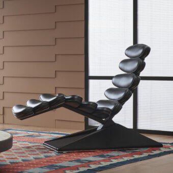 Exclusive Mascheroni Concorde lounge chair crafted with steel and birch wood, upholstered in glossy dark-toned leather with integrated electric controls