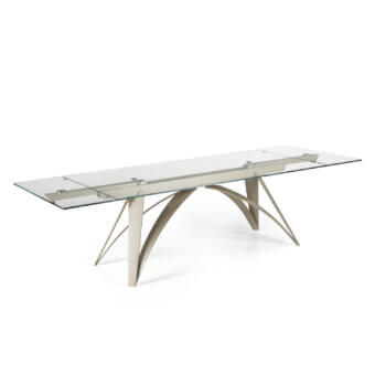 Distinguished Naos Brunelleschi table crafted with a clear glass tabletop and a satin light beige painted metal vaulted base