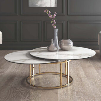 Distinguished Naos Colombo coffee table with a round ceramic top and golden-toned galvanized steel base in a satin finish