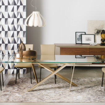 Superior Naos double extendable dining table with glass top and painted gold-tone metal base in walnut finish