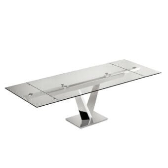 Distinguished Naos Minosse table with a clear glass top and polished light-colored metal base crafted in an innovative intersecting V-shaped design
