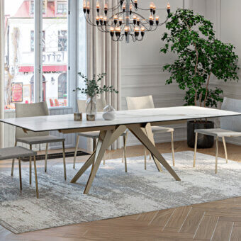 Distinguished Naos Somnia table with light glass tabletop and sleek gold-toned painted metal base